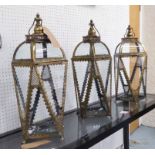 LANTERNS, a set of three, Hollywood Regency style, 70cm H.