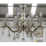 CHANDELIER, glass with eight branches and faceted hanging pendants, 59cm W x 51cm H excluding chain.