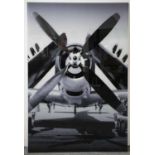 PHOTOGRAPH OF A NAVAL AIRCRAFT, on tempered glass, 12cm H x 80cm W.