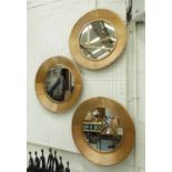 WALL MIRRORS, a set of three, 1960's French inspired saucer design, 52cm Diam.