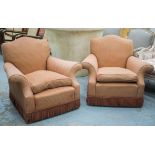 ARMCHAIRS, a pair, in check terracotta and tasseled upholstery with seat cushions and castors,