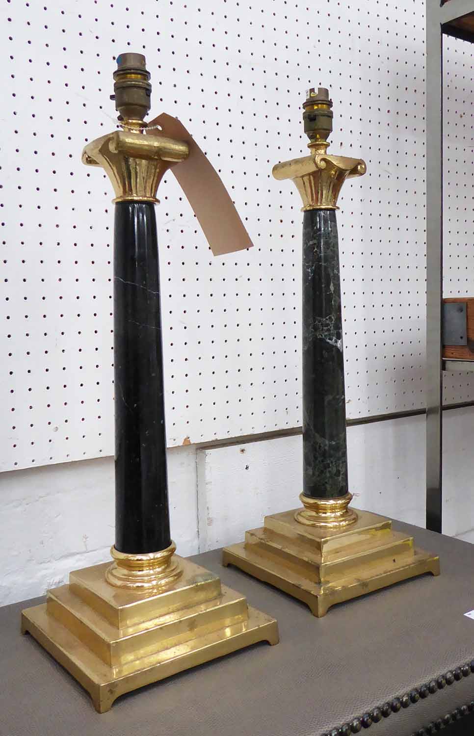 TABLE LAMPS, a pair, column form in onyx and gilt brass, marked 'FR' to the base, 52cm H.