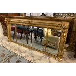 TRIPLE OVERMANTLE, William IV with a pilaster bordered wood and gesso gilt frame, 139cm W x 59cm H.