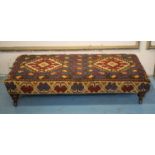 HEARTH STOOL, part Victorian mahogany in Turkish carpet upholstery with ceramic castors,