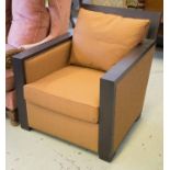 ARMCHAIR, Art Deco style ebonised oak with seat and back cushions in copper brown fabric,