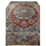 ANTIQUE KERMAN LAVER CARPET, 525cm x 362cm.