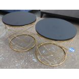 OCCASIONAL TABLES, a pair, circular ebonised tops gold metal wire bases, 42cm x 42cm x 40cm H.