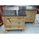 SIDE CHESTS, a pair, gilt and ebonised with three drawers, 61cm x 34.5cm x 58cm.