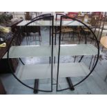 DISPLAY SHELVES, circular black framed with three opaque glass shelves, 137cm x 42cm x 120cm.