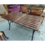 GARDEN TABLE, 139cm x 67cm x 65cm H and two iron chairs 62cm x 40cm x 85cm H.