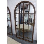 GARDEN MIRRORS, a pair, arched metal frames Indian Goa style, 170cm H x 90cm.