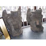 COMPOSITE STONE GROTESQUE GARGOYLES, a pair, 70cm H.