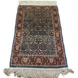 FINE HEREKE SILK RUG, 100cm x 65cm.