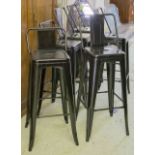 BAR STOOLS, a set of six, black metal and a similar pair with lower backs.