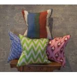 RIFAT IKAT SILK CUSHIONS, group of four, assorted designs.