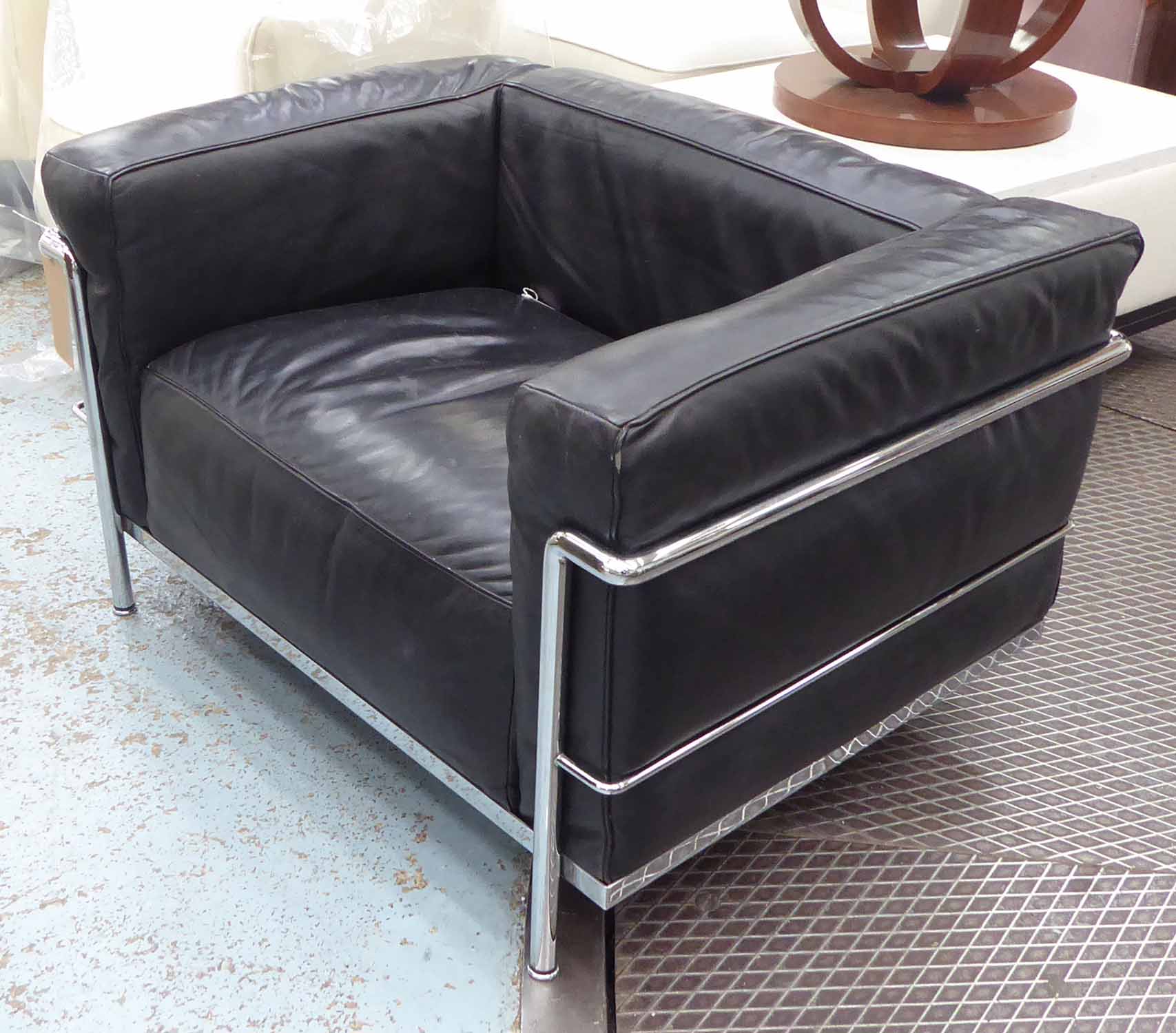 AFTER LE CORBUSIER LC3 STYLE ARMCHAIR, 100cm x 72cm x 62cm.