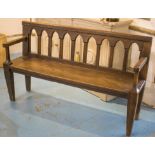 BENCH, 19th century Gothic revival oak with arcaded rail back, 142cm W.