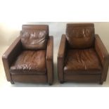 ARMCHAIRS, a pair, of small proportions in hand dyed brown leather and short supports, 74cm W.
