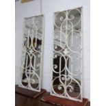 GARDEN WALL MIRRORS, a pair, French style, 128cm x 48cm.