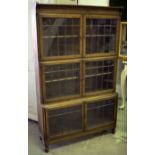 BOOKCASE, early 20th century oak with six leaded glass doors (one shelf support missing),