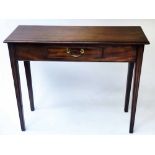 HALL TABLE, George III mahogany of adapted shallow proportions with short glove frieze drawer,