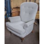 ARMCHAIR, Victorian style in ticking with seat cushion and castors, 83cm W.