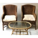 RATTAN ARMCHAIRS, a pair, vintage rattan winged double weave with cushions and X stretchered,