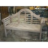 LUTYENS STYLE BENCH, weathered teak after a design by Sir Edwin Lutyens, 151cm W.