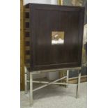 COCKTAIL CABINET, ebonised and chrome with two doors enclosing adjustable shelves,