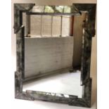 JULIAN CHICHESTER WALL MIRROR, rectangular aged mirror, with raised geometric cushion frame,