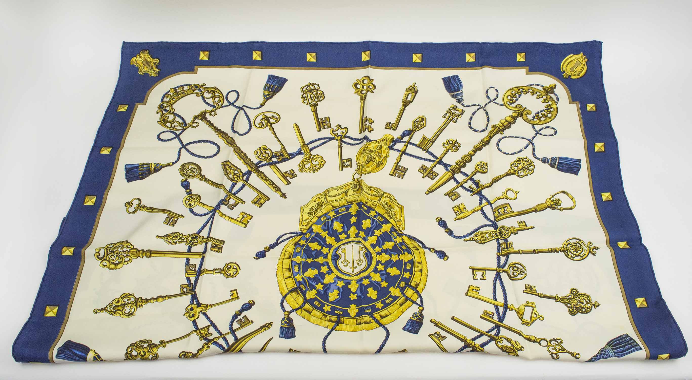 HERMÈS SCARF, 'Les clefs' of 'The keys', by Caty Latham, blue and gold,