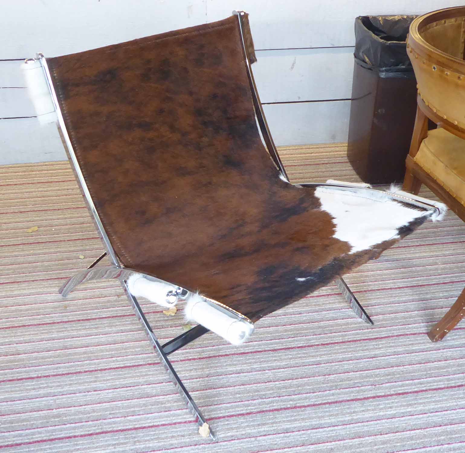 PANACHE CASA HIDE CHAIR, slung bovine hide seat on chrome base, 77cm H x 64cm.