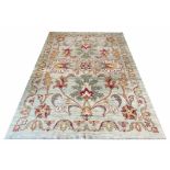 FINE BOULO OUSHAK CARPET, 308cm x 211cm, duck egg blue palmette and vine field.