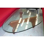 AFTER ISAMU NOGUCHI LOW TABLE, glass top with rounded edges on wooden support,