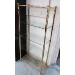 DISPLAY SHELVES, Hollywood Regency style, gilt metal with tempered glass shelves,