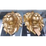LION HEAD WALL RELIEFS, a pair, gilt finish, 50cm x 40cm approx.