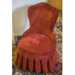 BOUDOIR CHAIR, of small proportions in red chenille upholstery with valance, 74cm H x 50cm.
