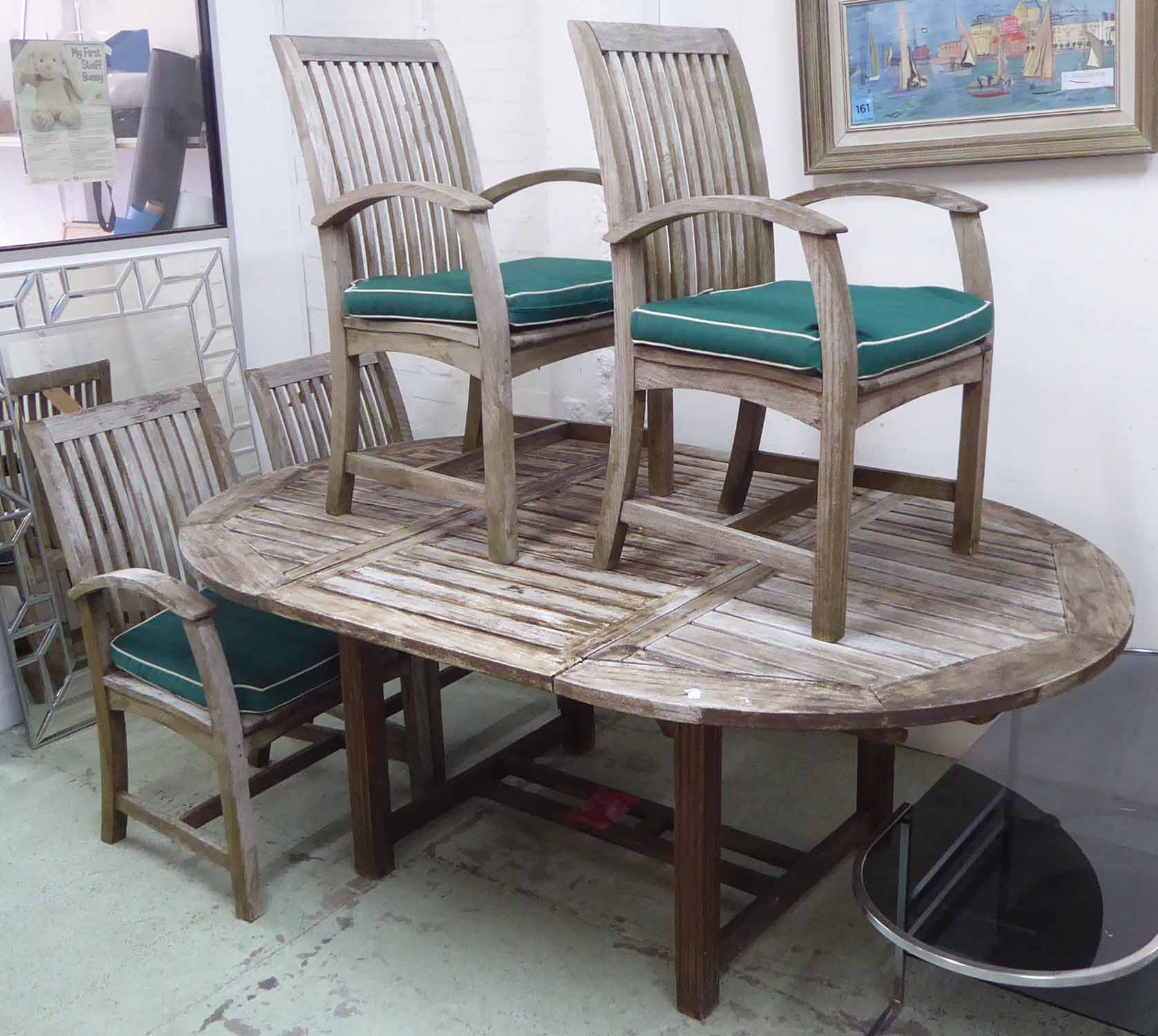 JULIAN CHICHESTER GARDEN CHAIRS, a set of four, and garden table, weathered teak 95cm H.