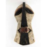 SONGYE (KIFWEDE) MASK, wood and pigment 46cm H x 20cm.