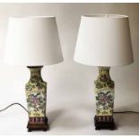 LAMPS, a pair, Chinese ceramic rose bouquet on imperial yellow and stand, 63cm H with shades.