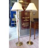 FLOOR LAMPS, a pair, English country house style, lion paw feet, with shades, 155cm H.