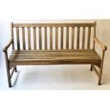 GARDEN BENCH, weathered teak of slatted construction, 137cm W.