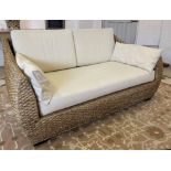 WICKER CONSERVATORY SOFA, to match the previous lot, 75cm H x 155cm x 85cm.
