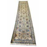 TABRIZ HAJI-JALLILY DESIGN RUNNER, 396cm x 89cm.