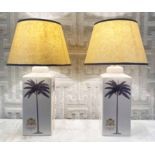INDIA JANE TABLE LAMPS, a pair, ceramic with palm tree and armorial decoration with Pooky shades,