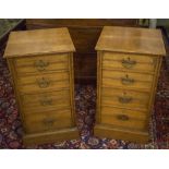 BEDSIDE CHESTS, a pair, Edwardian oak, each adapted with four drawers, 70cm H x 40cm x 39cm.