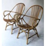 RATTAN ARMCHAIRS, a pair, 1970's 'spoon shaped' woven rattan each with embroidered cushion, 61cm W.