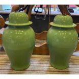 TEMPLE JARS, a pair, green ceramic, 53cm H.