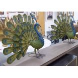 PEACOCKS, a pair, stylised metal studies, painted finish, 57cm H.