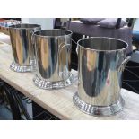 CHAMPAGNE BUCKETS, a set of three, stamped Louis Roederer, 25cm x 22cm diam.